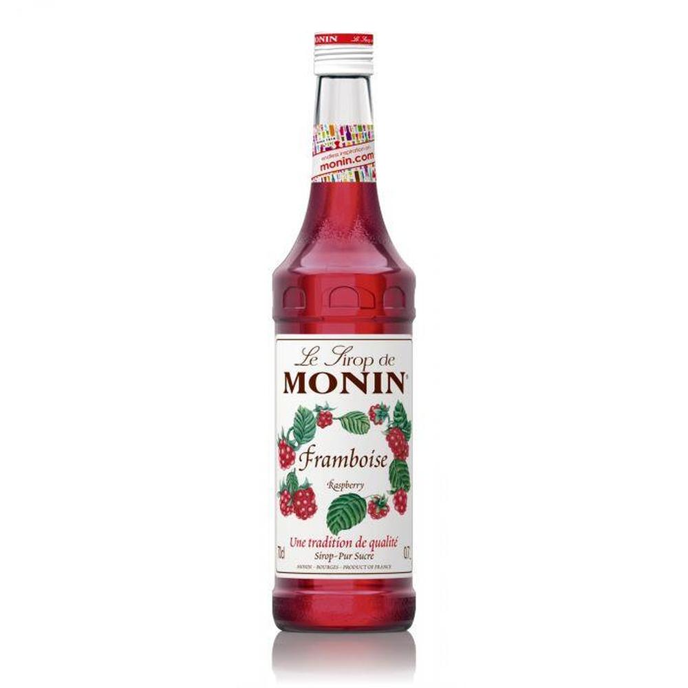 Monin Bringebærsirup 70 cl i glassflaske med rød etikett og bringebærmotiv.