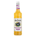 Monin Porn Star Martini drinkmix 100 cl flaske med lilla etikett og pasjonsfruktmotiv.