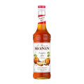 Monin Pumpkin Spice sirup 70 cl flaske med gresskar- og krydderdesign.