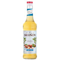 Monin Sukkerfri Hasselnøttsirup 70 cl i glassflaske med hvit kork og blå etikett.