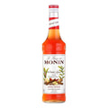 Monin Winter Spice sirup 70 cl flaske med rød væske og krydderetikett.