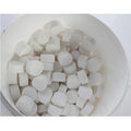 NutroMix gjærnæringstabletter, 2,4 gram, i en hvit beholder for ølbrygging.