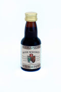 Strands Irish Whiskey essens 25 ml i liten brun flaske med gullkork.